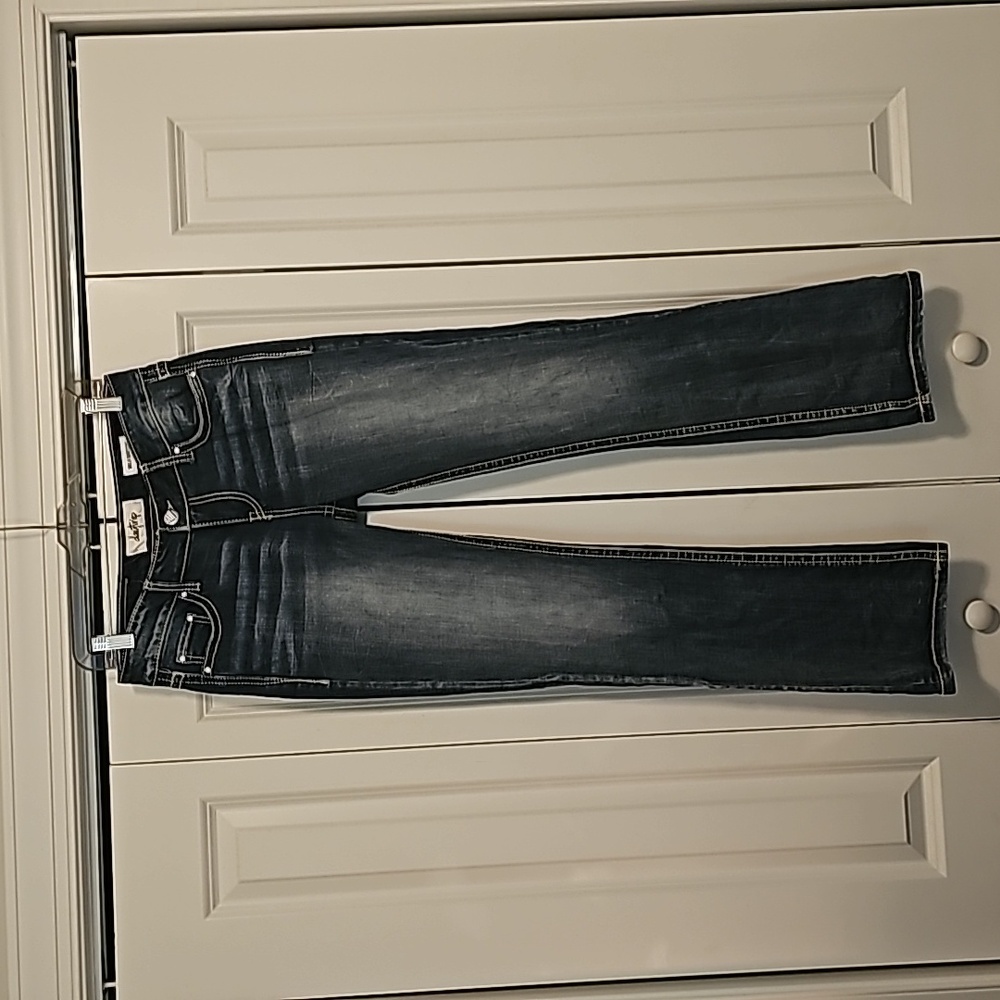 Daytrip Buckle midrise bootcut Jeans. The Myla model.